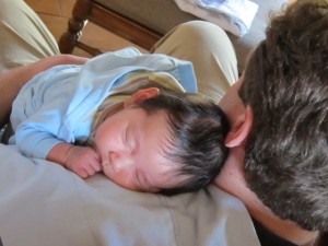 Liam sleeping on his dad's shoulder